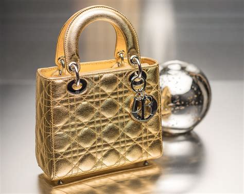 gold lady dior bag.